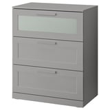 Gray BRIMNES chest with 3 drawers and frosted glass top for safety and style.