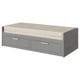 Grey modern sofa-bed with 2 drawers, cushioned top, compact design.