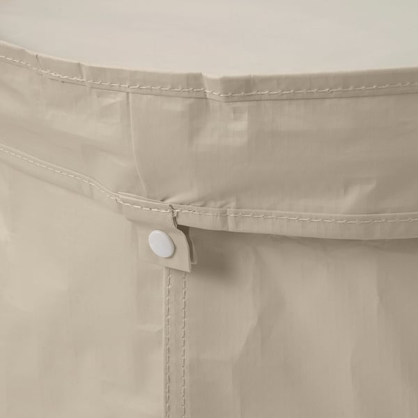 Close-up of DIMPA bags sturdy white handle and durable stitching, showing quality and craftsmanship.