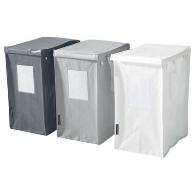 Three DIMPA waste sorting bags in black, light gray, and white. They are rectangular, durable, with side handles and clear label pockets.