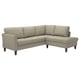 Modern beige l-shaped sofa with rolled arms, wooden legs, and removable fabric cover.