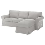 EKTORP light grey sofa, modern design with rolled arms, plush cushions, neutral color, l-shaped corner section.