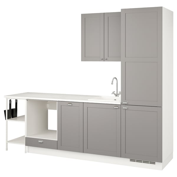Modern kitchen setup in grey. Cabinets, sink, and countertop. Minimalist design.