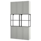 An ENHET kitchen storage unit in grey with a mix of open and closed cabinets, providing ample storage and a modern look.