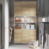 Modern bathroom cabinet: ENHET with light wood doors, open shelves, gray curtains. Size: tall, fits between door & window.
