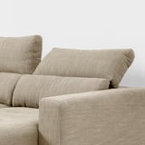 Sofa with adjustable headrests and extendable chaise longue. High back for neck support.