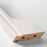 White fiberboard plinth with sleek design, cut-out for ventilation, high-quality finish.