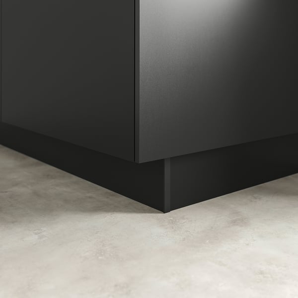 Black kitchen cabinet plinth, covering floor gap, uniform kitchen look.