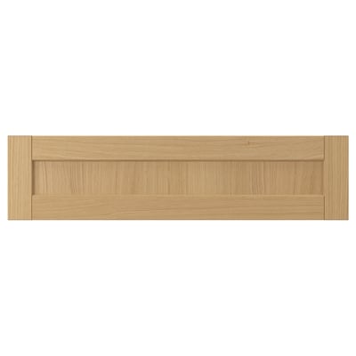 Forsbaka kitchen cabinet front in warm oak wood, featuring beveled drawers, natural oak finish.