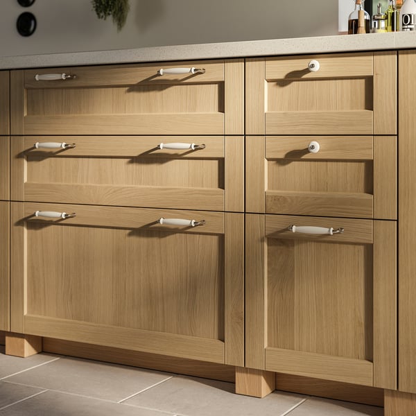 Furniture: forbacka oak kitchen drawers, light brown, wooden, rectangular handles.