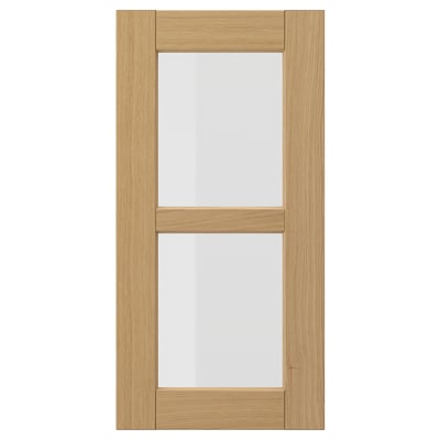 FORSBACKA: light oak wood kitchen cabinet door with glass panel, warm, rectangular design.