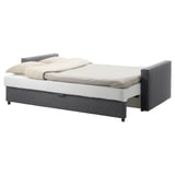 Convertible sofa with built-in storage, ideal for small spaces. Grey upholstery, back cushions included.