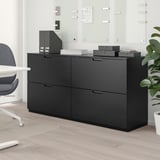 GALANT black wooden storage unit, modern office, fits under whiteboards, holds files, boxes, chair nearby.