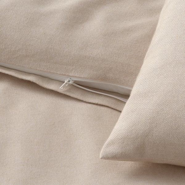 Soft fabric duvet with zipper closure, light beige color, high-quality cotton.