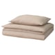 A neatly folded beige GROVSNÄRJA duvet cover and pillowcase set made from soft, brushed cotton flannel, perfect for cozy nights.