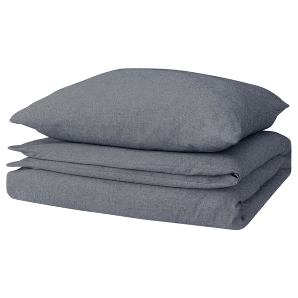 Stacked gray cotton duvet covers with zipper closure.