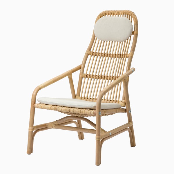 Wicker armchair with cushions. Easy-clean, zippered covers for seat and headrest, offering comfort and support.