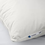 A plush, white pillow labeled GULKAVLE on a smooth surface, showcasing its soft, feathers, and down-stuffed quality.