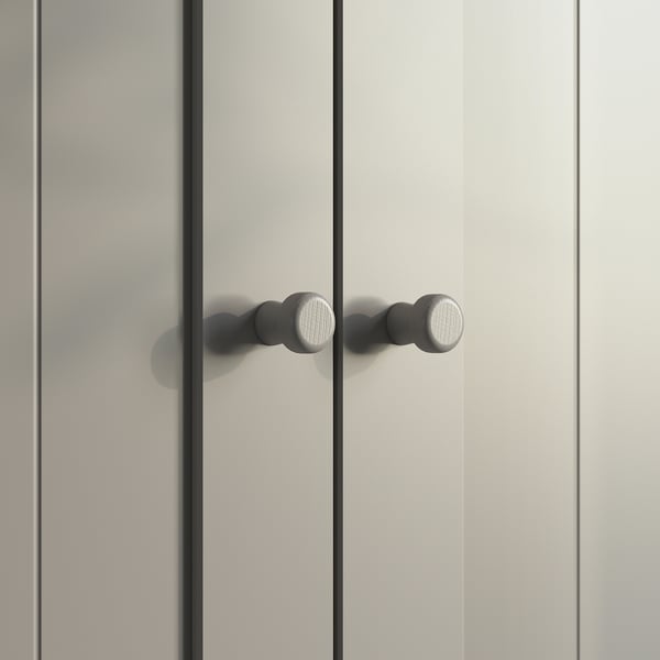 White GULLABERG cabinet door, modern design with round silver handle, sleek and minimalist look.