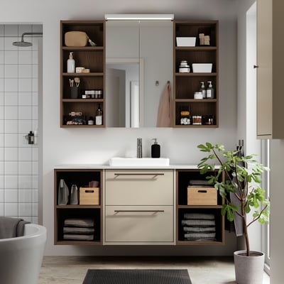 Modern beige bathroom vanity with open shelves, wooden accents, and wall-mounted mirror.