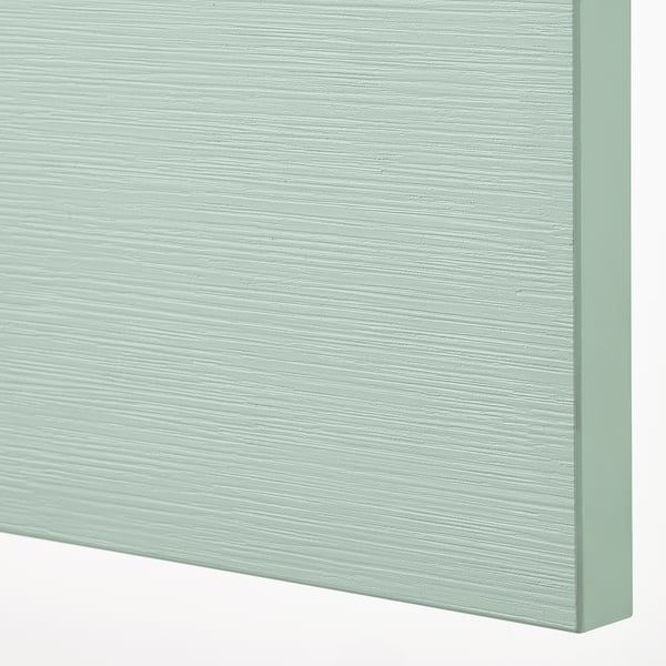 Closeup of HJORTVIKEN drawer with subtle textured finish, showing quality and detail.