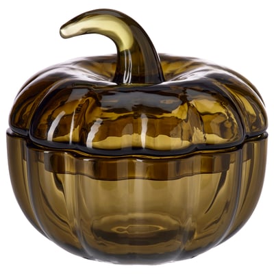 A brown glass pumpkin-shaped container with a lid and stem handle, designed for autumn decor.
