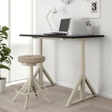 IDÅSEN white desk with adjustable table, stool, laptop, lamp, mug - modern workstation.