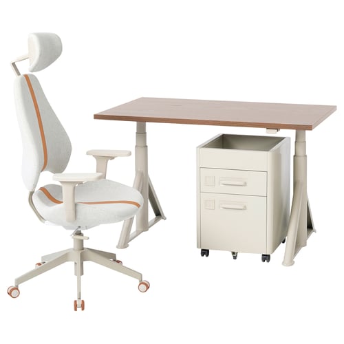 Modern office setup: light wooden desk, white chair, beige file cabinet.