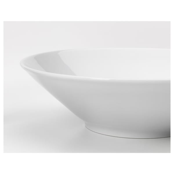A pristine white deep bowl, smoothly curved and sleek, showcasing its fine porcelain finish.