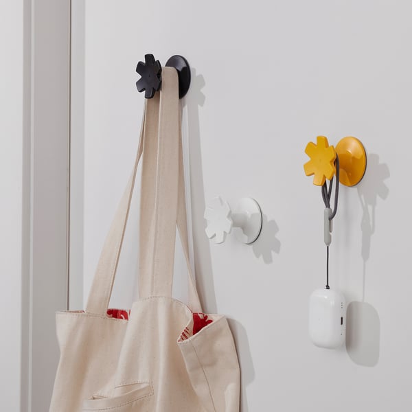 Hooks: simple, colorful snowflake design. Sturdy, hold up to 2 kg. Hangs bags, accessories. Easy to attach, decorative storage.
