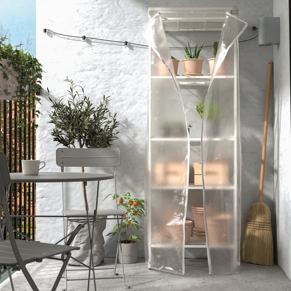 JOSTEIN clear shelving unit with cover, stores plants on balcony, tall and narrow.
