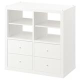 White ikea KALLAX with shelves and drawers, modern design.