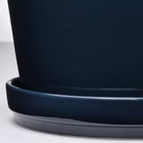 Blue round planter with saucer.