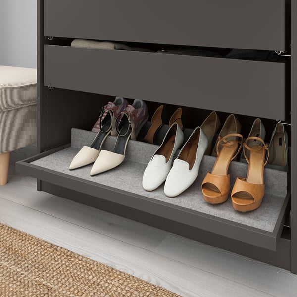 Shoe storage shelf with felt lining for displaying and protecting footwear.