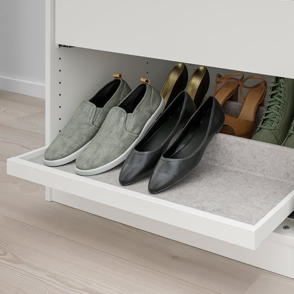 Shelf with felt liner holds sneakers, heels, sandals; pull-out tray organizes.