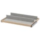 An ikea KOMPLEMENT pull-out tray. It has a wooden frame, grey felt bottom, and dividers. Ideal for organizing small items.