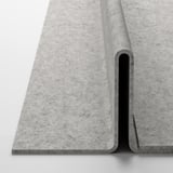 Modern, gray fabric drawer with smooth edges and silent close feature.