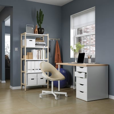 Modern home office with white LAGKAPTEN desk, wheels, chair, and storage unit against a gray wall.