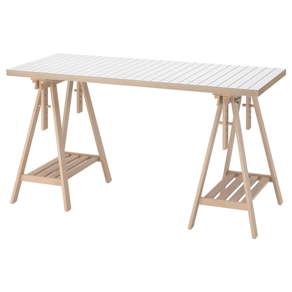 Wooden sawhorses with birch legs, adjustable, and patterned fiberboard tabletop.