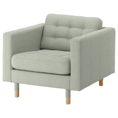 Depicts a LANDSKRONA armchair in light green fabric with wooden legs. It a tidy, stylish design with soft cushions for comfort.