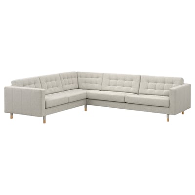 Light grey corner sofa, modern design with tufted cushions, wooden legs, and removable armrests.