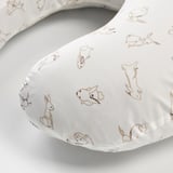 Cuddly white baby pillow with soft, enjoyably printed bunnies, crafted from smooth cotton.