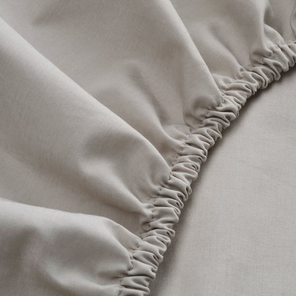 Elastic edge fitted sheet, crafted from soft cotton and lyocell blend, ensuring secure and comfortable sleeping.