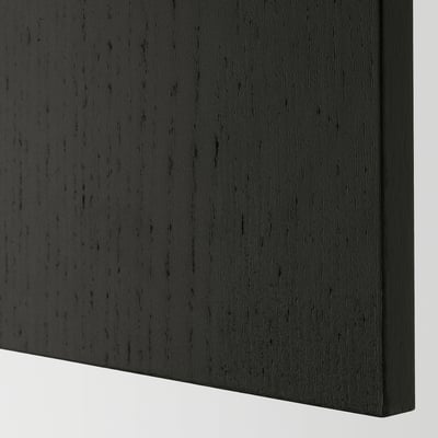 Black kitchen cabinet panel with beveled edges and traditional design. Made from particleboard, ash veneer, and clear acrylic lacquer.