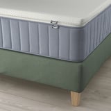 IKEA LILLFJÄLLET bed with cushions, oak legs, and vågstranda mattress, offering medium firmness and 7 comfort zones.