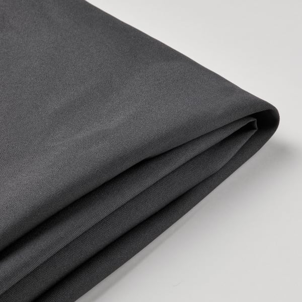 This image shows a neatly folded dark grey fabric, likely a parasol canopy, demonstrating its smooth texture and quality.
