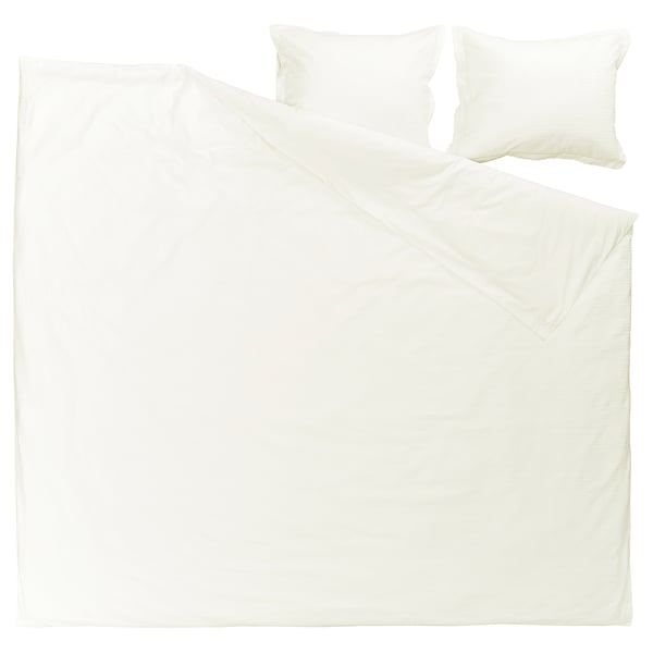 Image shows a white LUKTVICKER cotton duvet cover set with waffle texture and classic design. Includes two pillows.