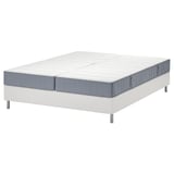 Two white split mattresses on a white bed base. Modern, clean design.