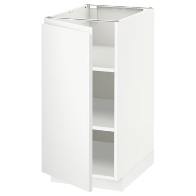 White METOD kitchen cabinet, modern design, one door open, adjustable shelves.