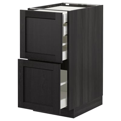 Black kitchen cabinet with open drawer, dark wood finish, modern design.